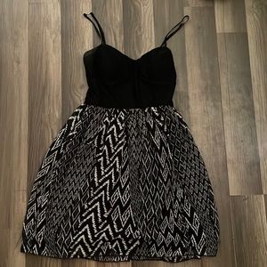 Black corset top dress with flowy bottom